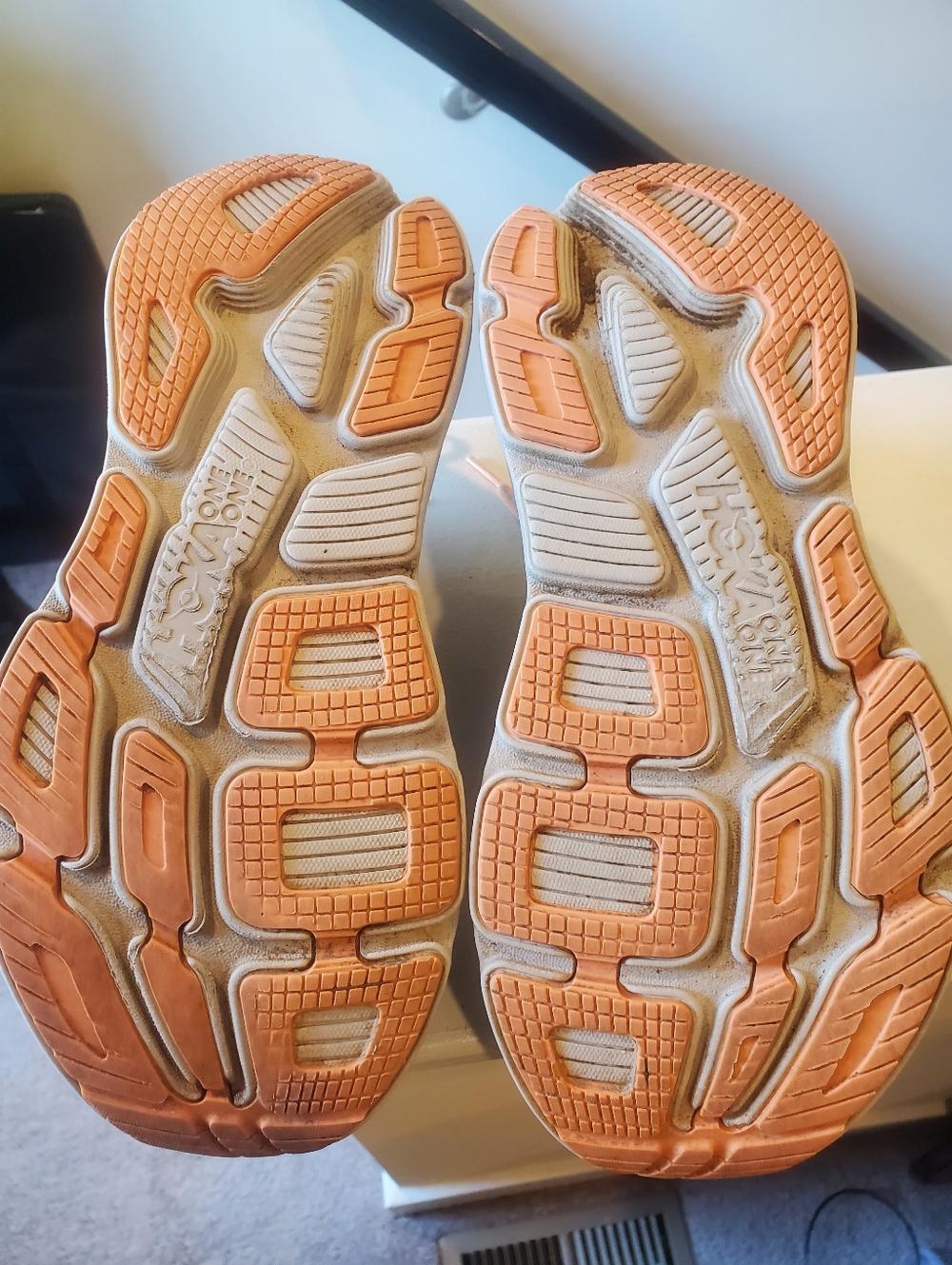 HOKA Bondi 7 running shoes in a clean gray & peach colorway - Picture 6 of 7